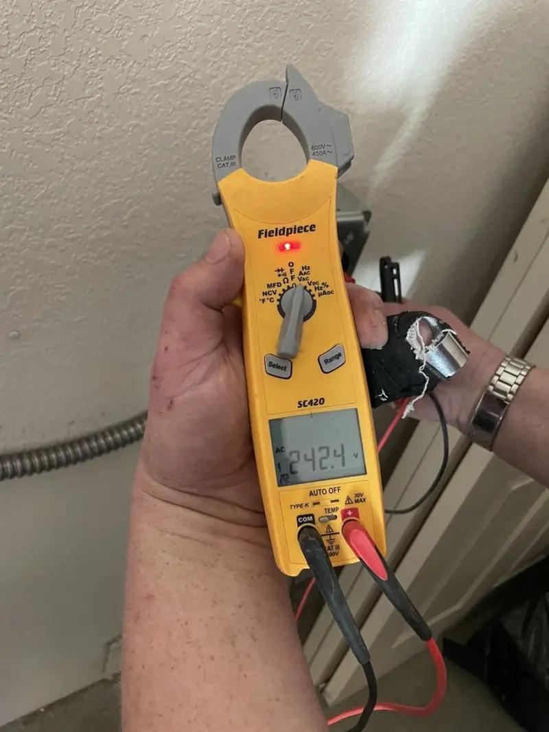 Voltage testing with clamp meter during Hot Tub / Pool Electrical Wiring in Bel Aire